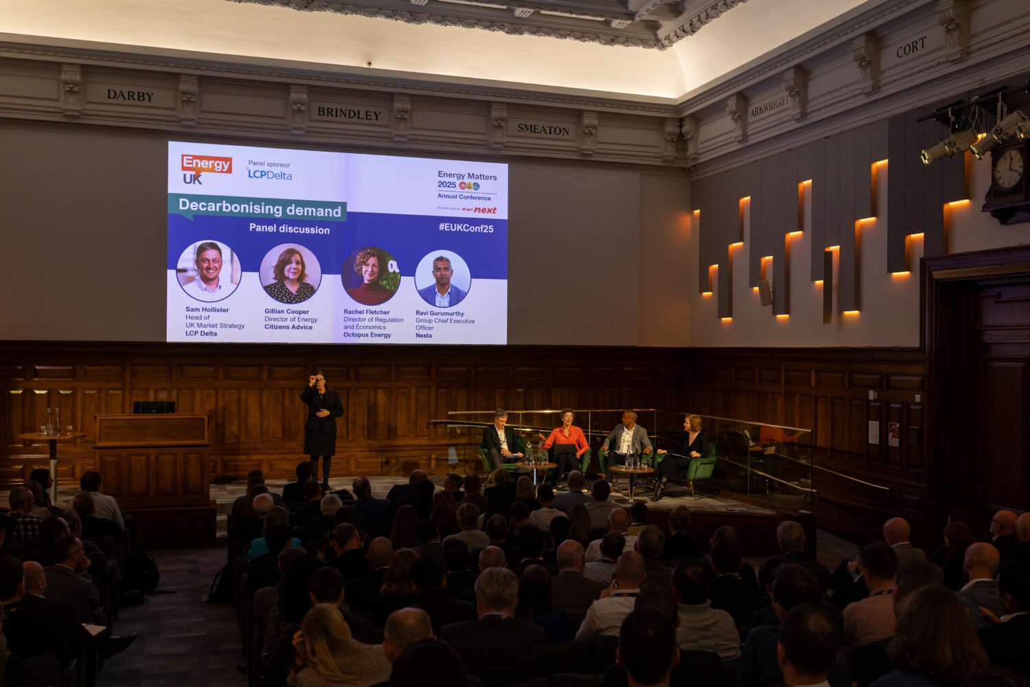 wide shot of an Energy UK annual conference 2025 panel in front of audience members